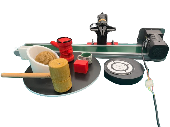 Real-world experimental apparatus and objects: robot gripper, conveyor, turntables, cup, block, hammer, and catching basket